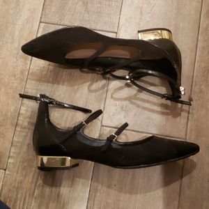Black Aldo flats with gold heel and three straps